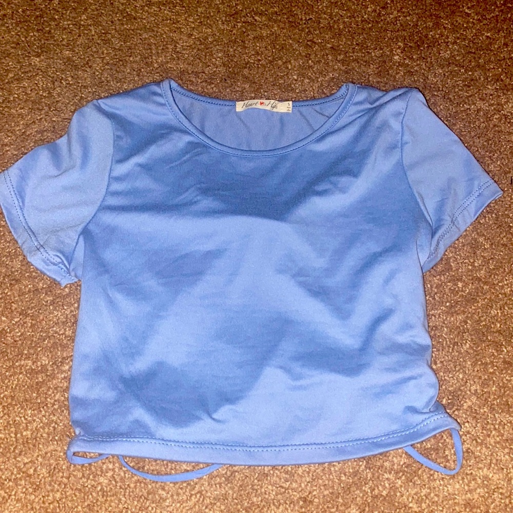 Blue crop top with open back